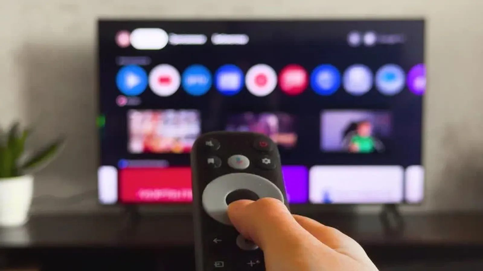 IPTV Smarters Pro subscription streaming live TV on a Smart TV with the remote in hand